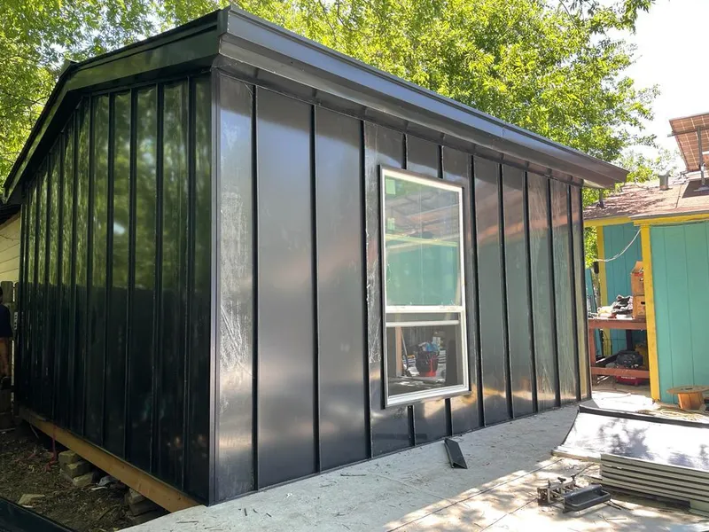 Black standing seam metal wall panels for Metal Roof Installation in Cortlandville